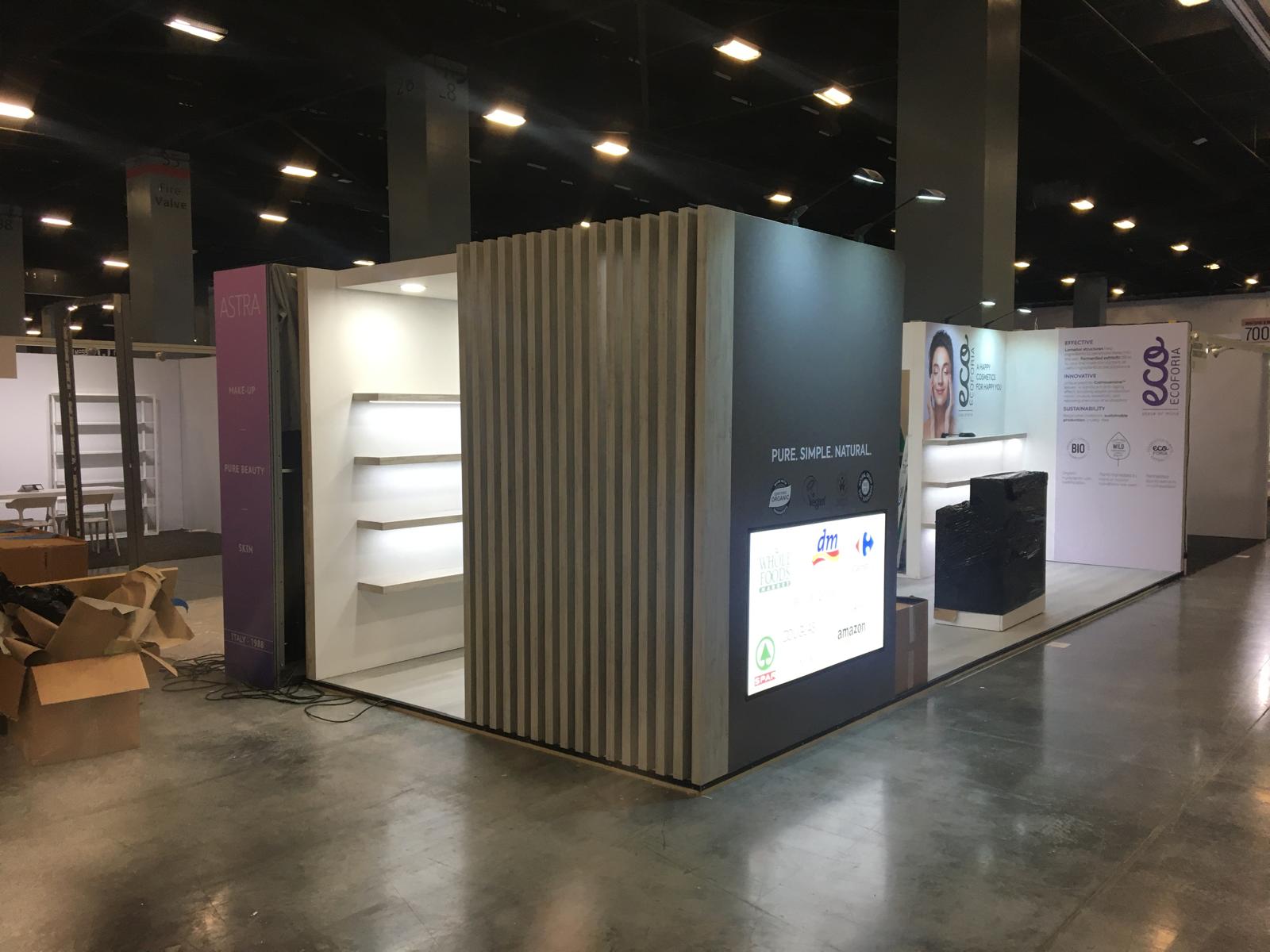 Exhibition stand with digital display and branding